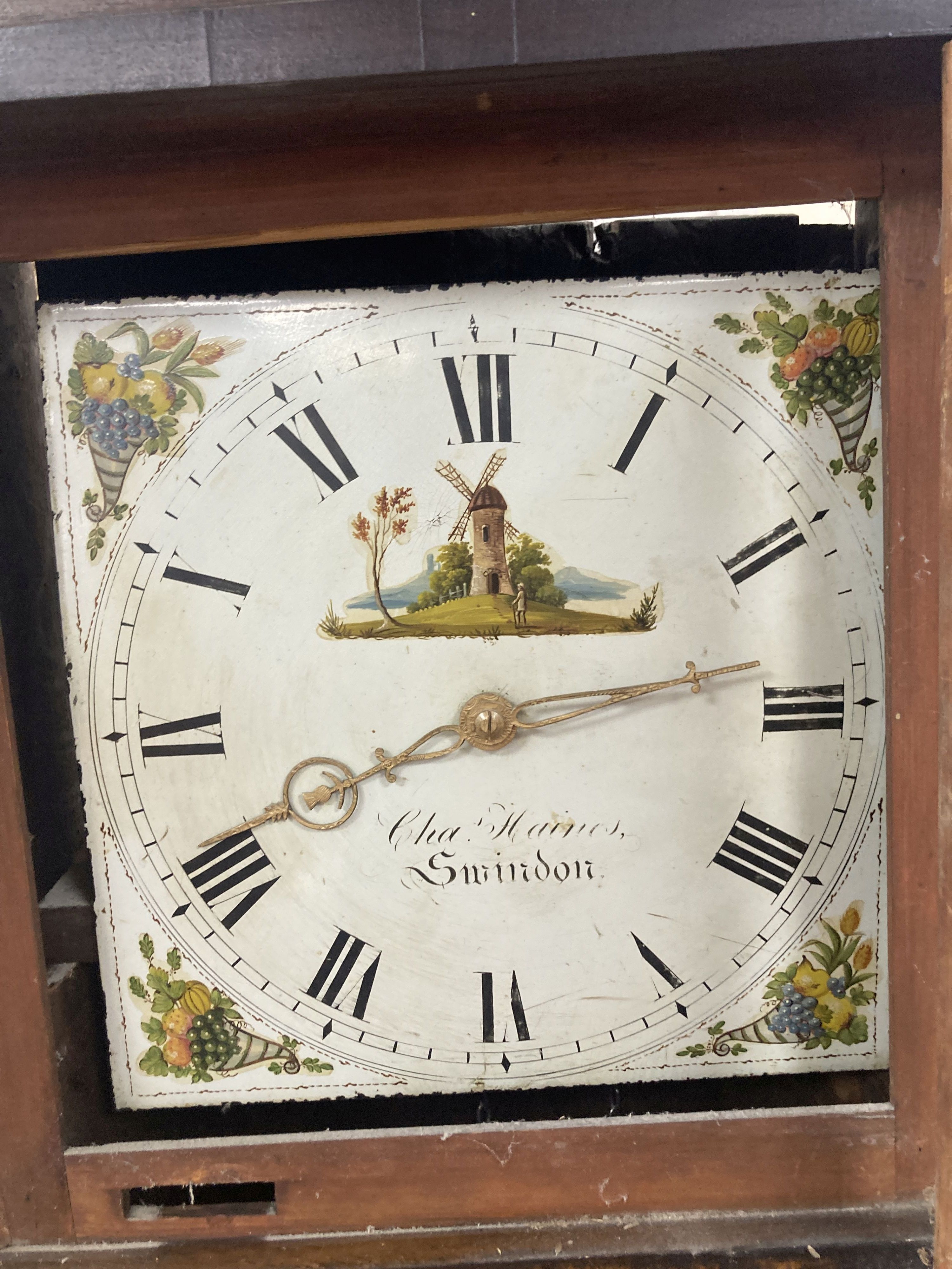 A small 19th century oak cased longcase clock (for restoration) 30 hour grandfather clock, the painted dial named Cha. Haines, Swindon,